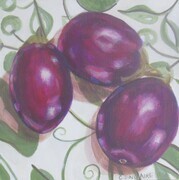 Eggplants on a Green and White Tablecloth